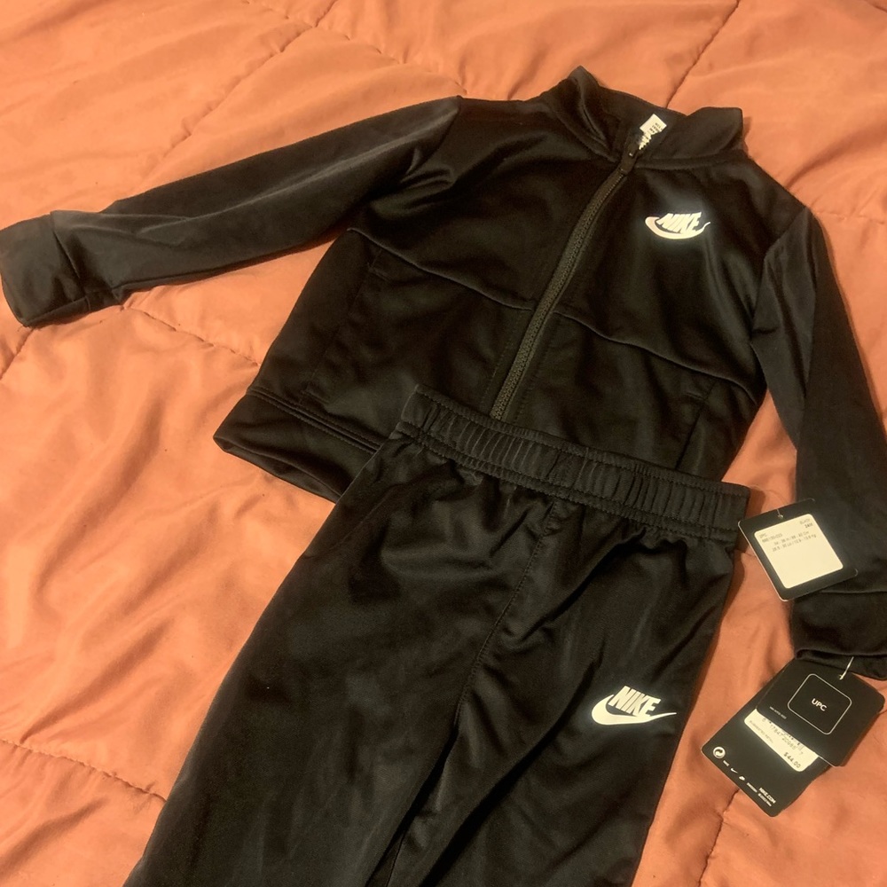 Black two pice nike set 24 moths new with tags